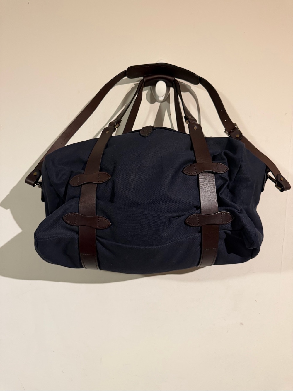 Filson medium twill Men's Navy Canvas Duffel Bag with Brown Leather Straps